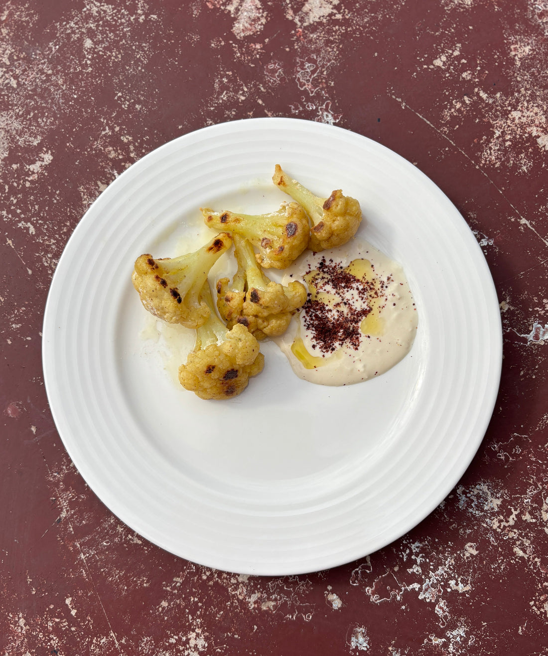 Roasted cauliflower florets with sumac tarator sauce